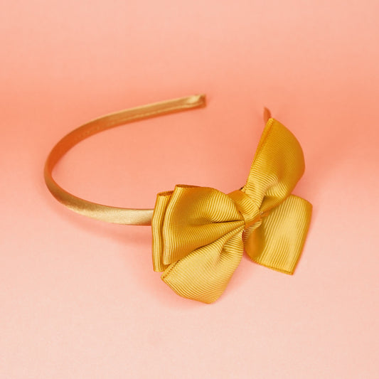 Golden bow headband