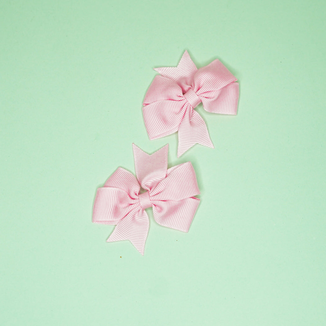 Powder pink bow hairclip