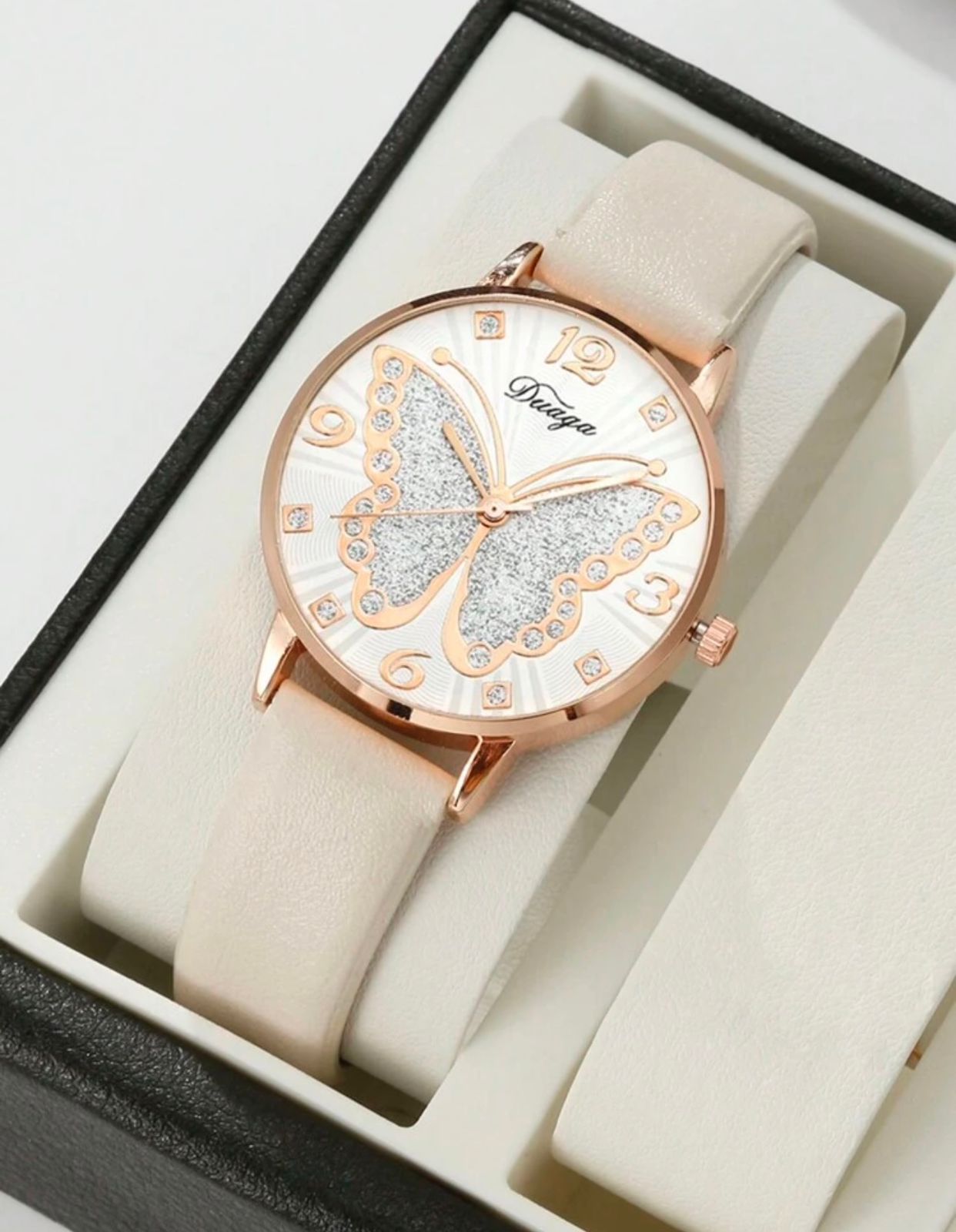 Butterfly dial with leather strap watch