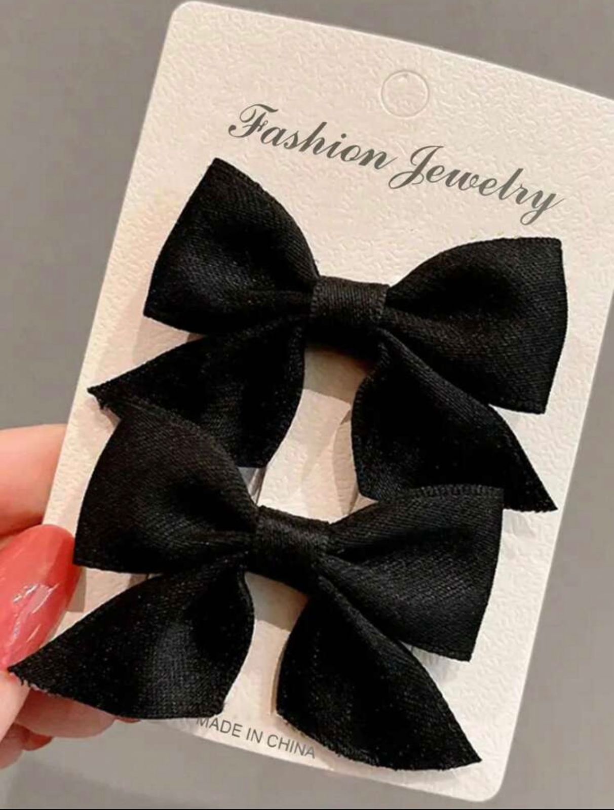 Solid black bow hairclip